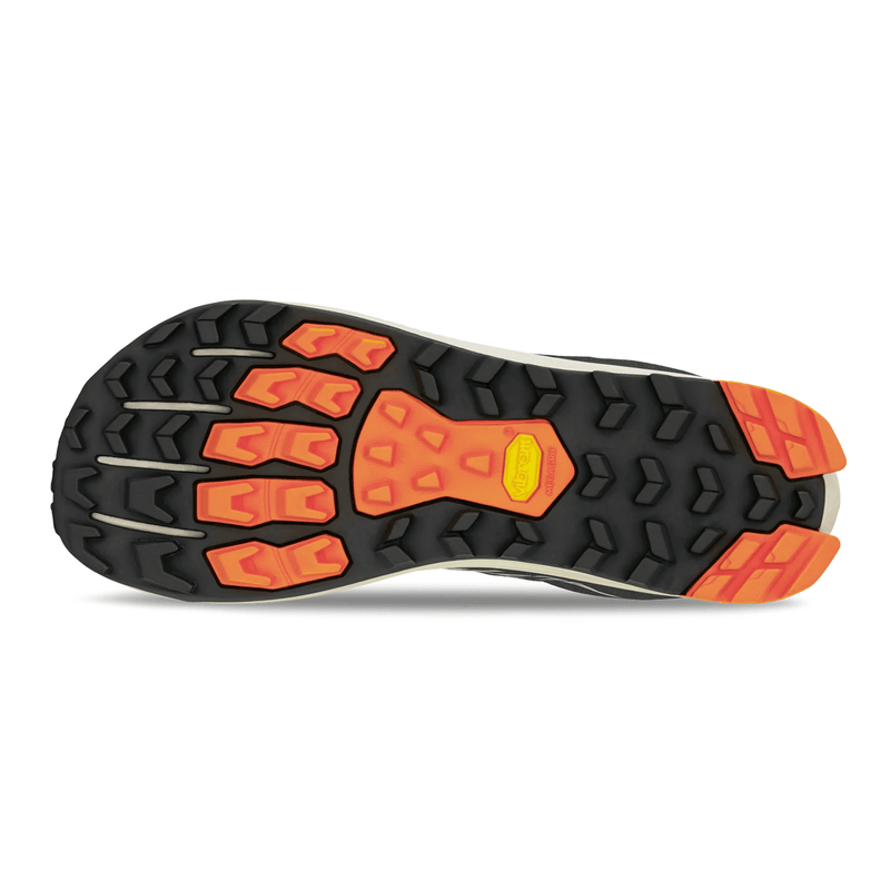 Load image into Gallery viewer, Close-up of a shoe sole with orange and black pattern on a white background