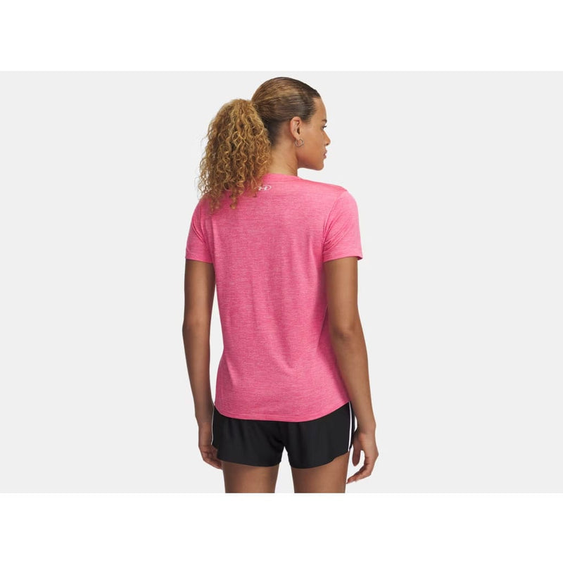 Load image into Gallery viewer, Woman wearing a pink athletic shirt and black shorts on a white background
