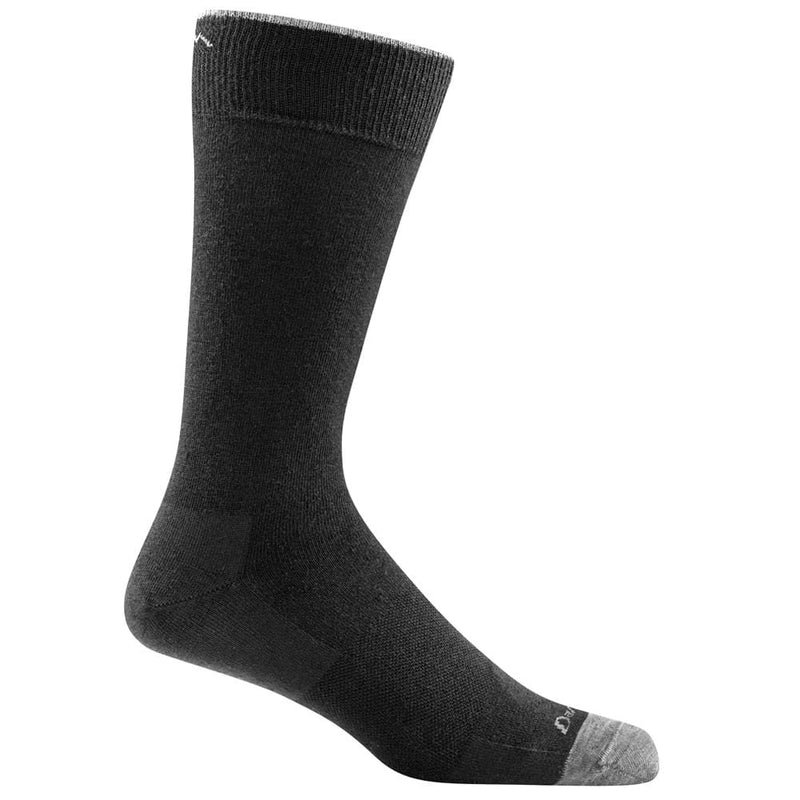 Load image into Gallery viewer, A pair of black Darn Tough crew socks designed for men, showing the side profile of the socks with the brand logo visible.
