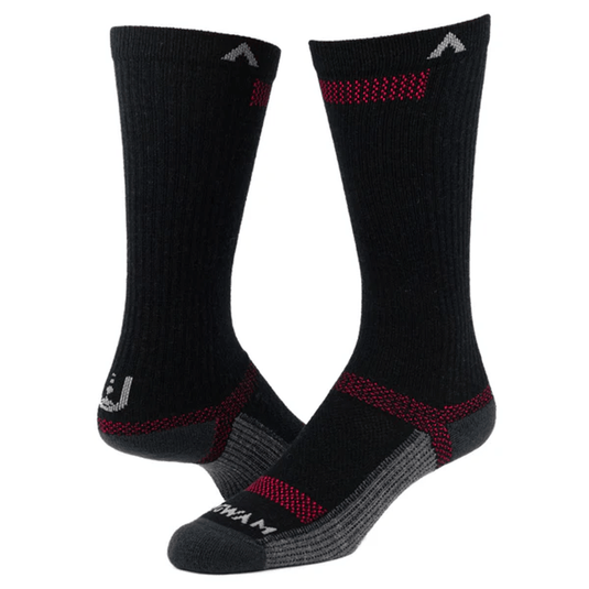 Pair of black socks with red accents on a white background