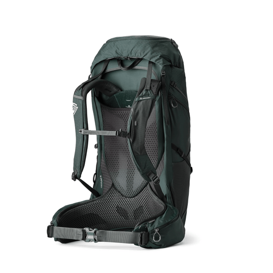 Green hiking backpack on a white background